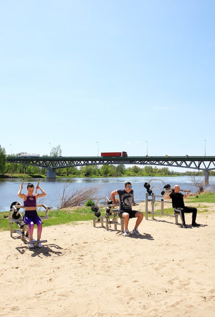 Overview of various IVE outdoor fitness stations in a city park - Ive Summer